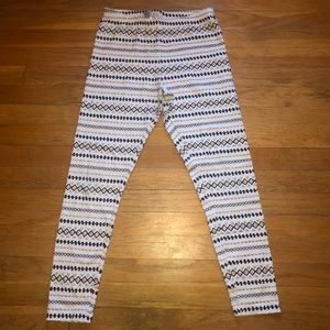 Gold metallic & black print size 14/16 leggings